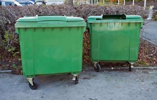 Construction site waste being cleared by professionals